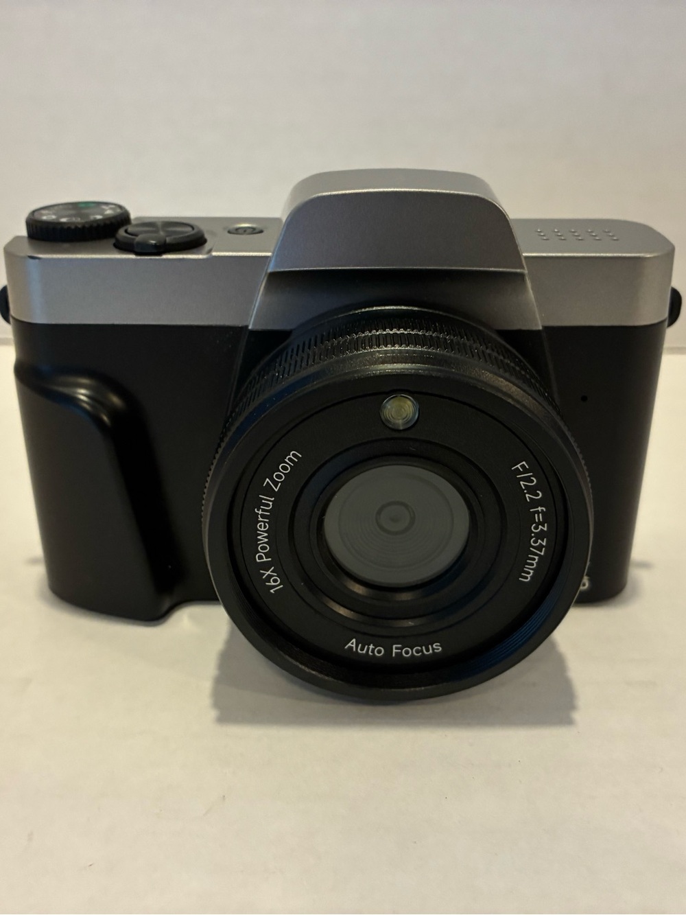 Compact Black and Silver Digital Camera with Auto Focus